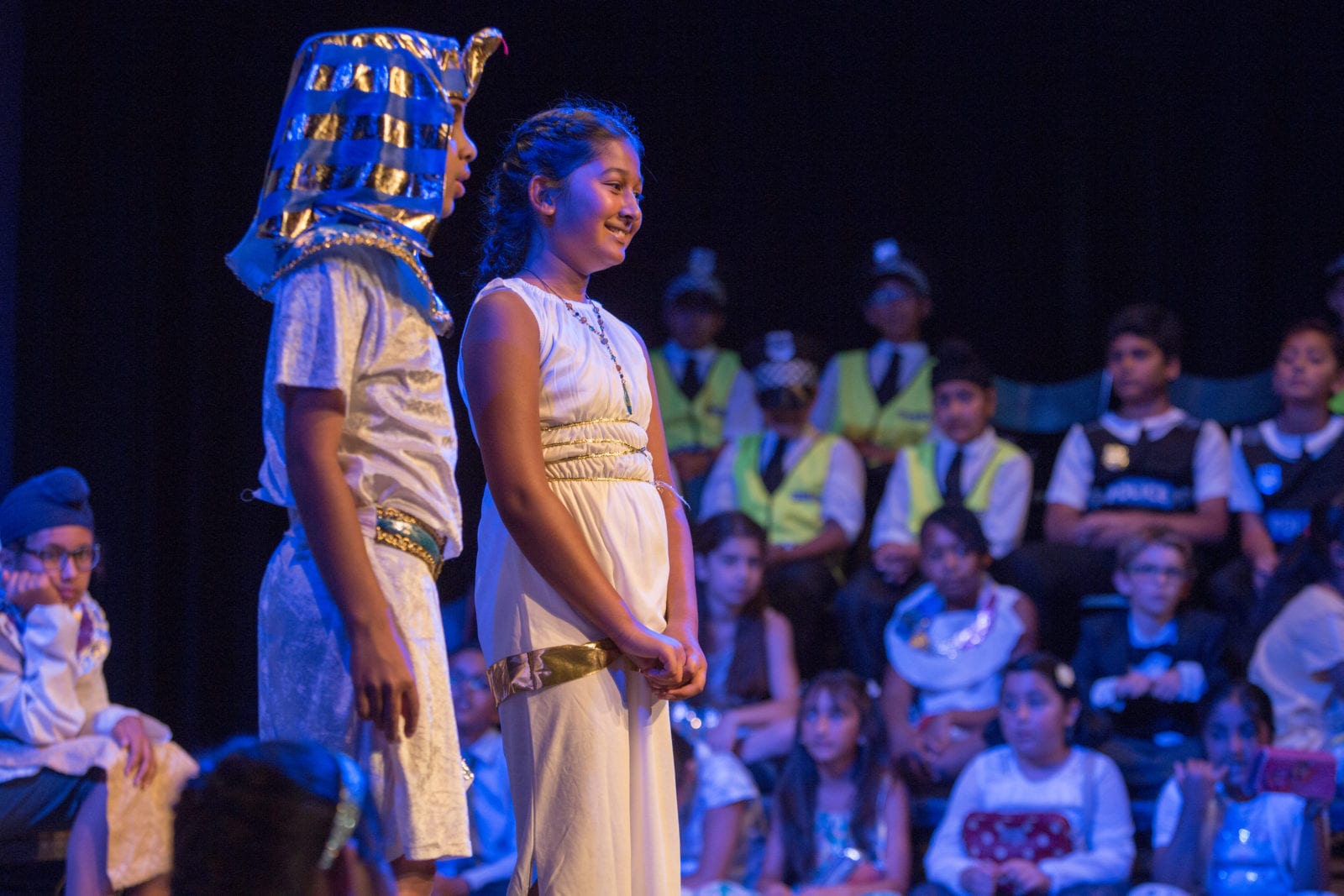 Image of two pupils on stage participating in a school play - www.ashtonhouse.com